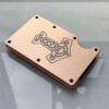 Metal RFID-blocking wallet featuring a deeply engraved Thor’s Hammer and Celtic knotwork, symbolizing protection and power.