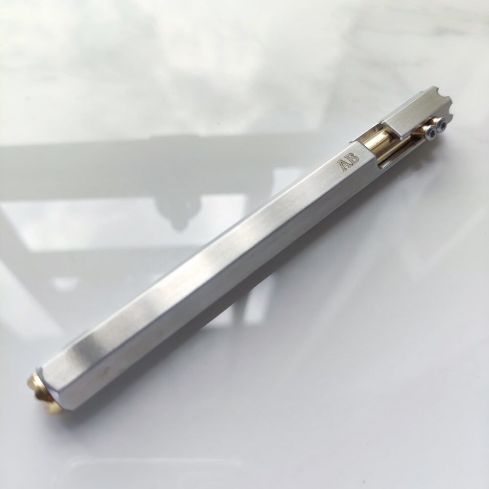 Sleek Stainless Steel Tactical Pen – Hexagonal Bolt Action Luxury Writing Tool
